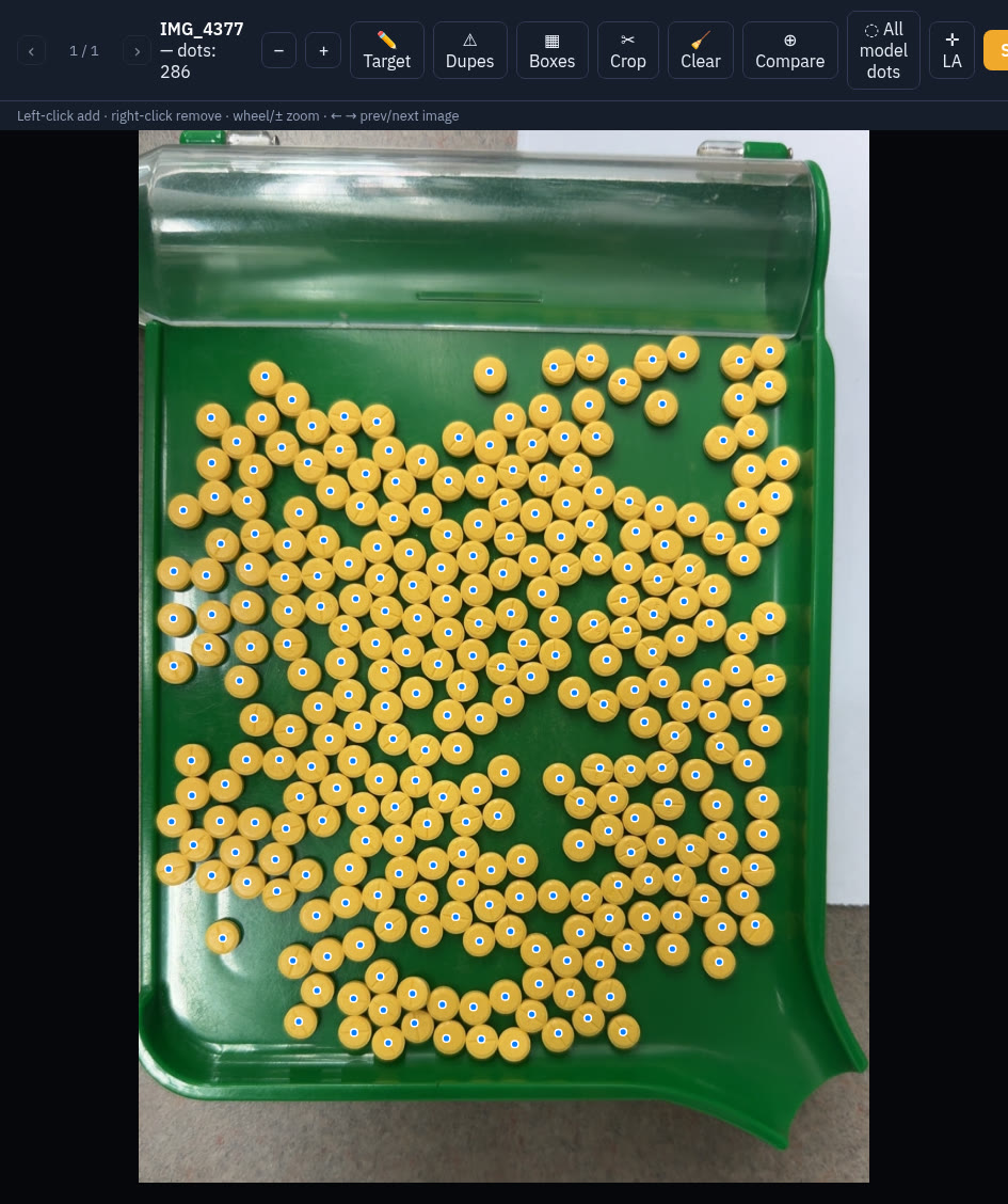 The editor over a real production photo: 286 tablets, a dot on every one